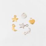 Charm Estrella en Plata con recubrimiento de Oro amarillo para pendientes aro